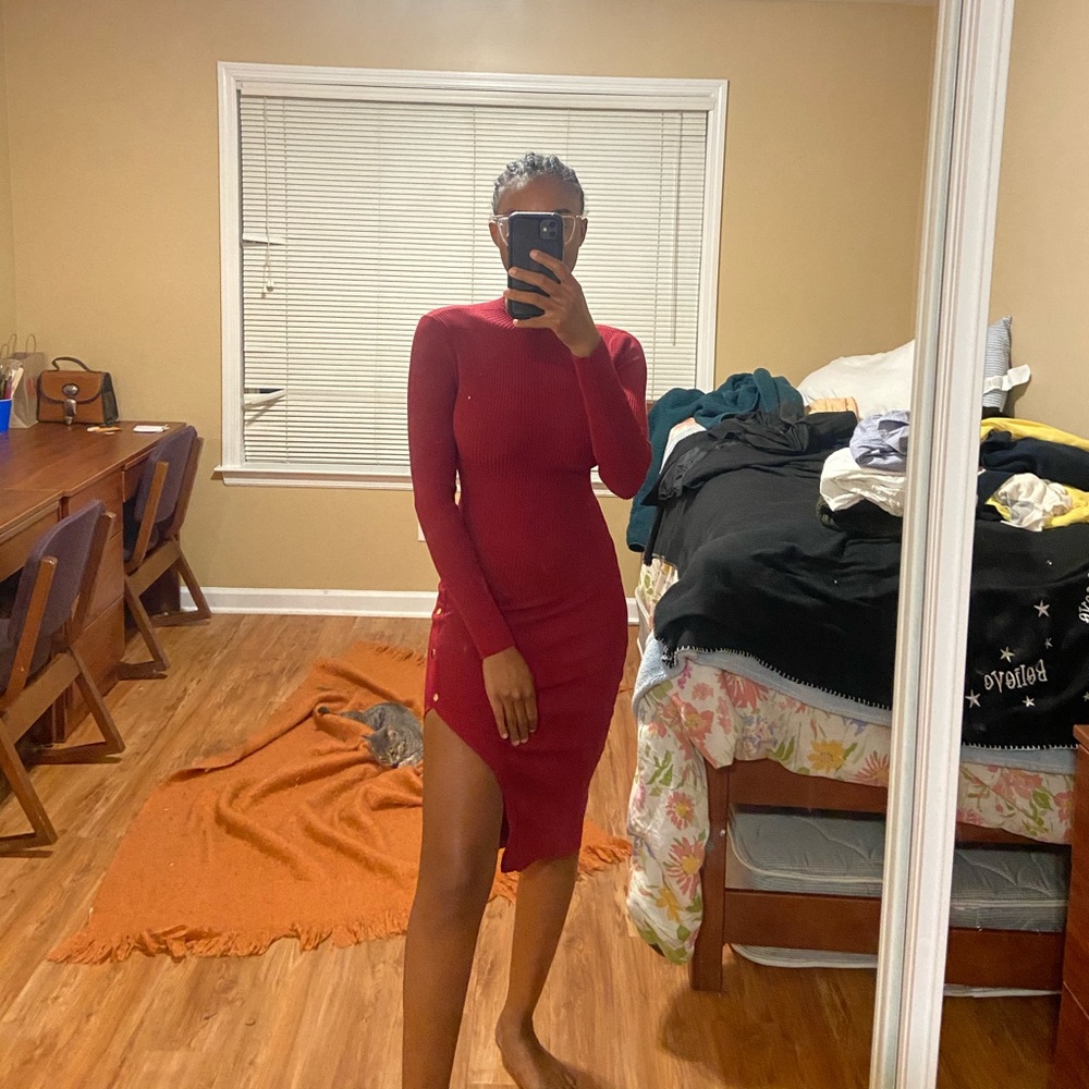 Red high slit mm dress with gold button detailing